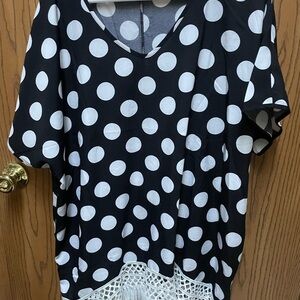 Polka Dot V-Neck Top with Lace Hem